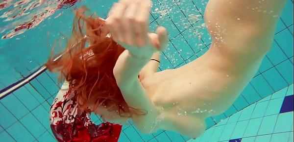  Hairy brunette teen Marketa underwater swimming